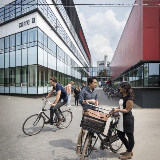 Students talking on campus.