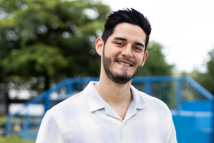 Student Marco looks into the camera