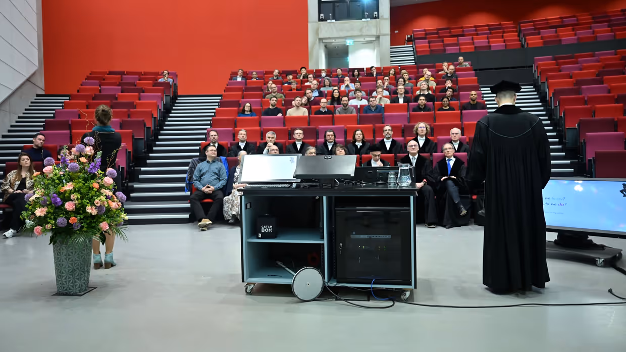 Prof. Wouter M. Koolen viewed on the back with the audience in sight