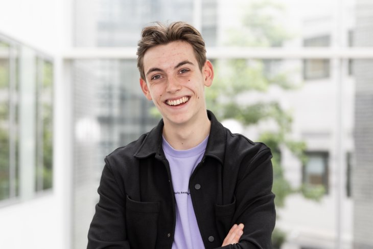 Student Yarno smiles into the camera