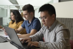 Students behind their laptop