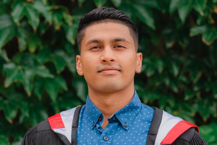 Environmental & Energy Management student Zamin smiles into the camera.