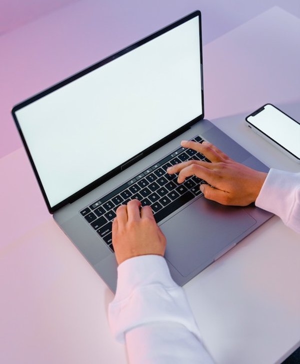 Laptop and phone screens.